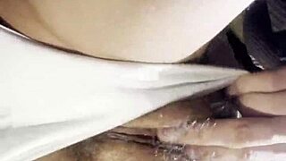 Hot brunette student masturbates and cums brightly after studying