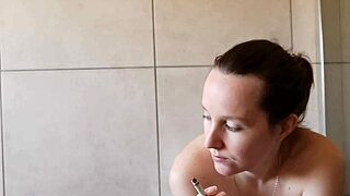 Check out this cute skinny babe smoking solo in the bathroom.