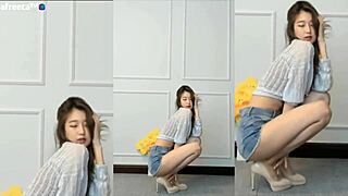 hey, check out this cute korean girl dancing so sexy and seductive with her big tits bouncing?