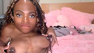 i feel excited performing a striptease for the camera as an ebony midget with big tits and ass undressing slowly