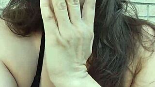 KELLY KENDRICKS SMOKES CIGARETTES OUTDOORS WITH BIG TITS CLEAVAGE ON DISPLAY!