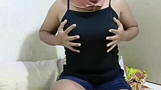 hey, check out this arab housewife in hijab going solo with a dildo on her big tits and pussy while the house is empty, loving every moment of that amateur masturbation vibe