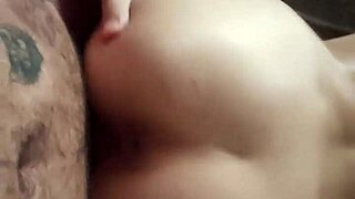 Doggy rests comfortably on the couch.