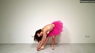 Curly gymnast stretches pussy legs on sofa naked