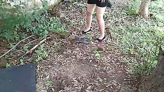 oily indian milf fingers wet pussy with bottle deep in jungle outdoors